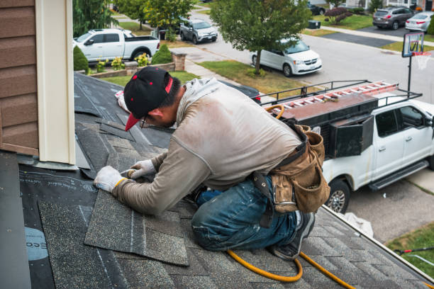 Professional Roofing technician working in Hathorne, MA